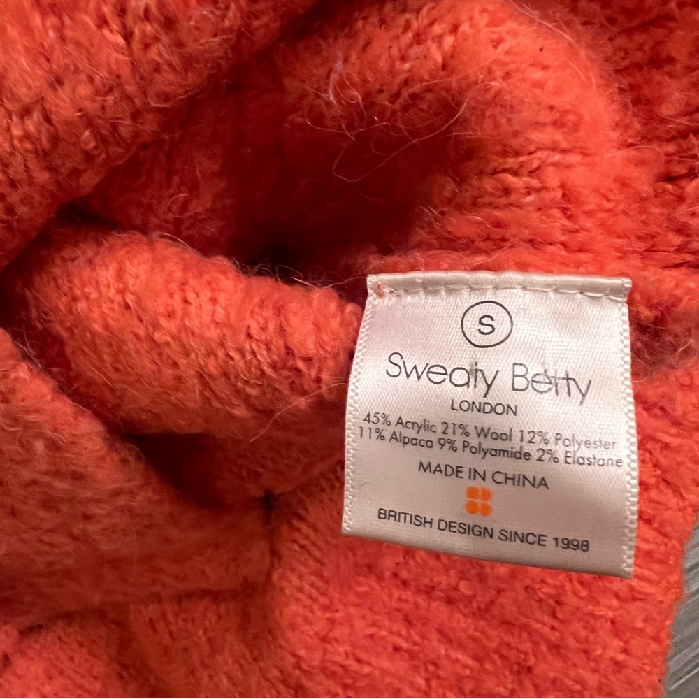 Sweaty Betty Orange Boucle Side Zip Turtleneck
Sweater - Picture 11 of 15